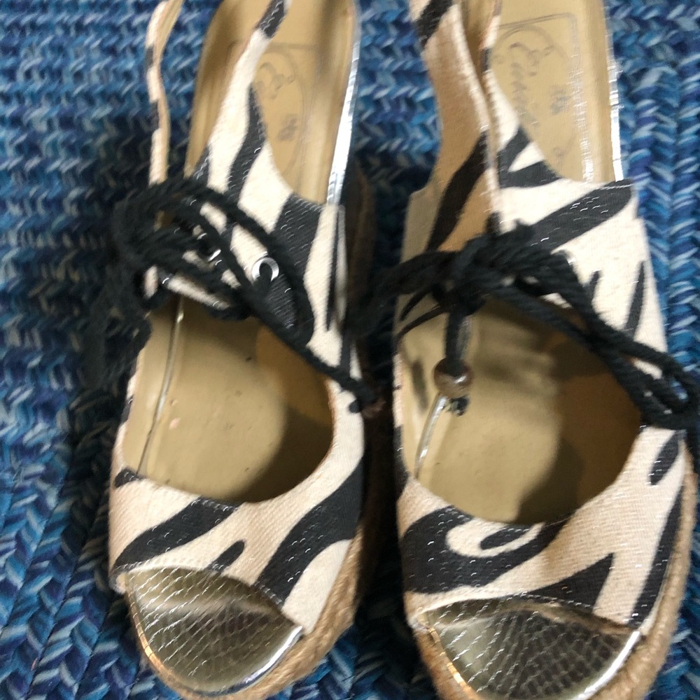 Curation size 5.5 platform style sandal with zebra leather fabric & silver heel